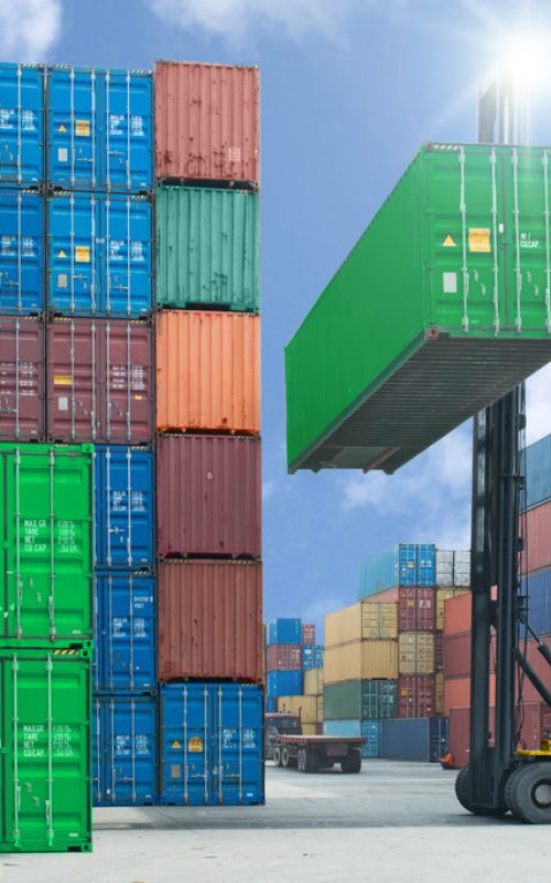 forklift handling container box loading to truck in import expor